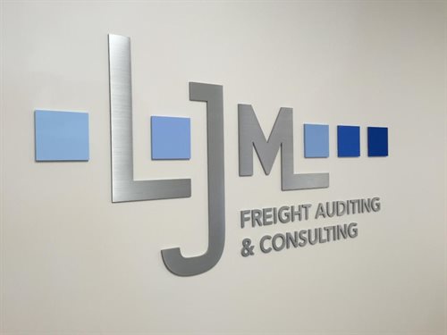 LJM Freight auditing and consulting Sign wall 1/4" thick custom, Water jet cut Natural Satin Aluminum and Laset Cut 1/4" plexi / acylic Logo , custom 