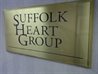 logo wall sign medical practice doctors office smithtown new york suffolk heart group brass plaque