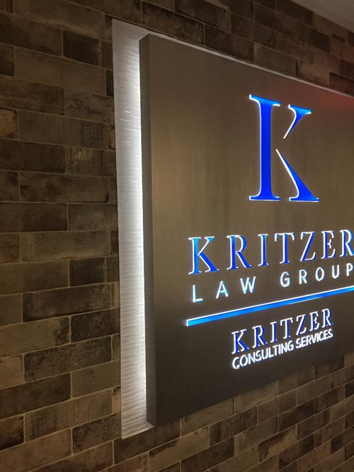 Kritzer law group,  Attorney Fabricates acrylic logo brushed aluminum led back and front lit smithtown village of the branch nesconsett lake grove